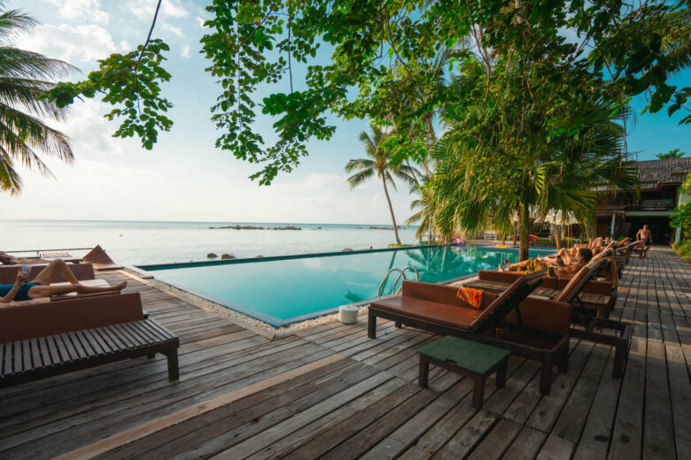 A hotel swimming pool overlooking the ocean