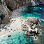 An ariel view of a beach in Sardinia