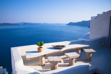 A look out to blue seas from a Santorini terrace