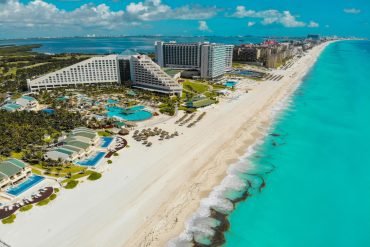 a beach view of hotels in Cancun Mexico