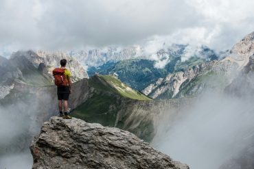 Hiker looking out over the mountains